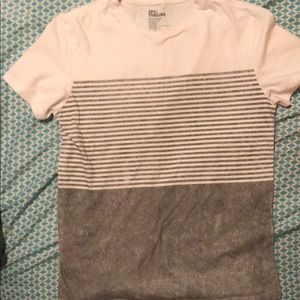 I am selling a white and grey striped t-shirt